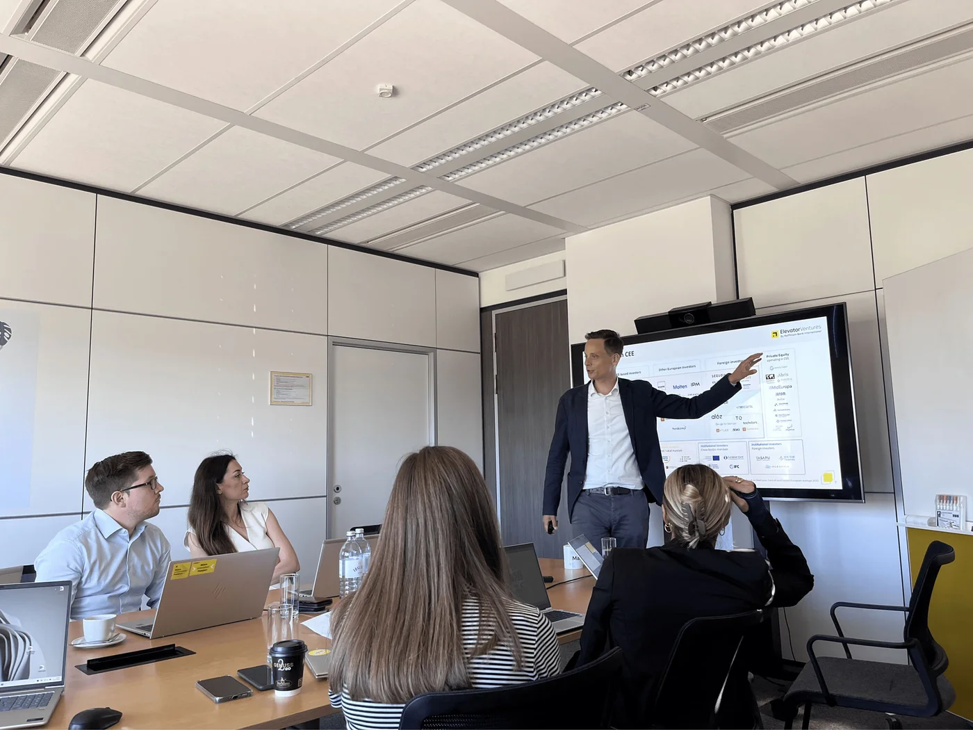 Business presentation in modern office setting