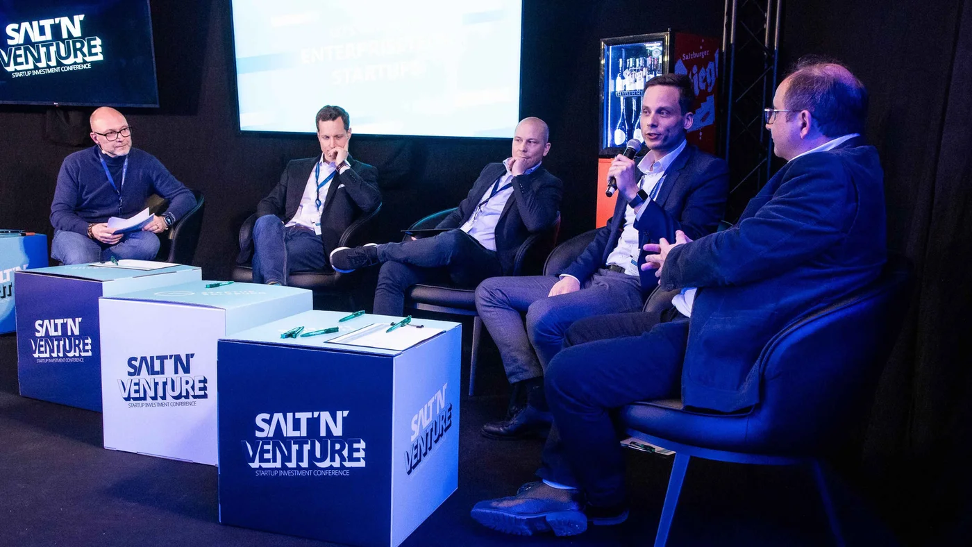Stage panel with five speakers of out which one is Maximilian Schausberger