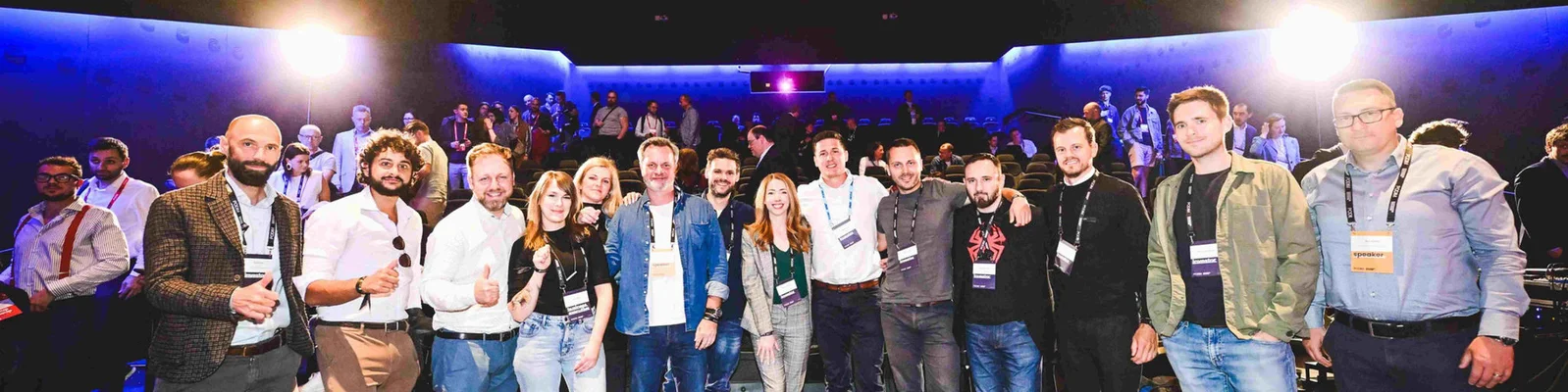 Group picture taken on stage during a large event