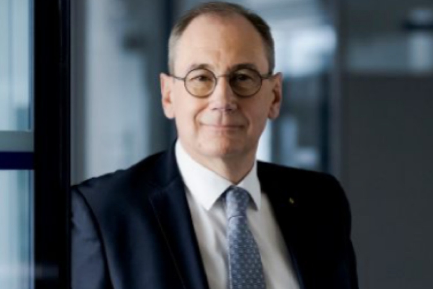 Portrait of Martin Schaller with window background