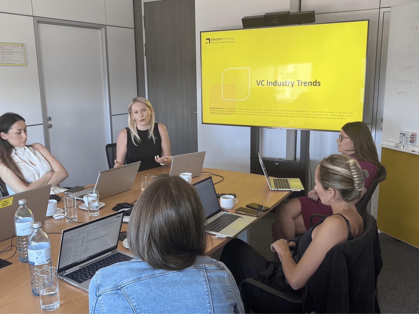 Business meeting discussing VC industry trends